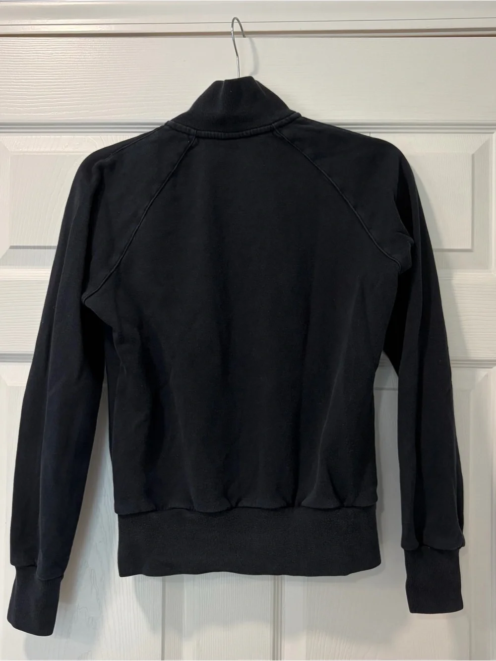 Nike Black Fleece Jacket with Orange Tag and White Swoosh